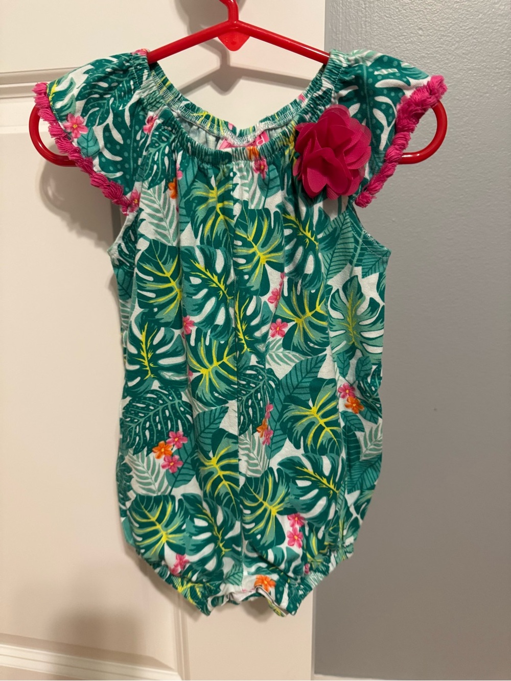 Tropical Leaf Print Baby Romper with Pink Flower Accent
